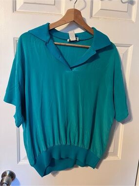 Blue-green vintage 100% silk polo shirt.